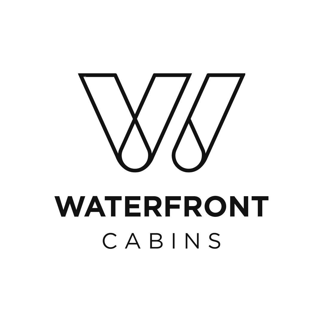 Logotyp för WATERFRONT CABINS